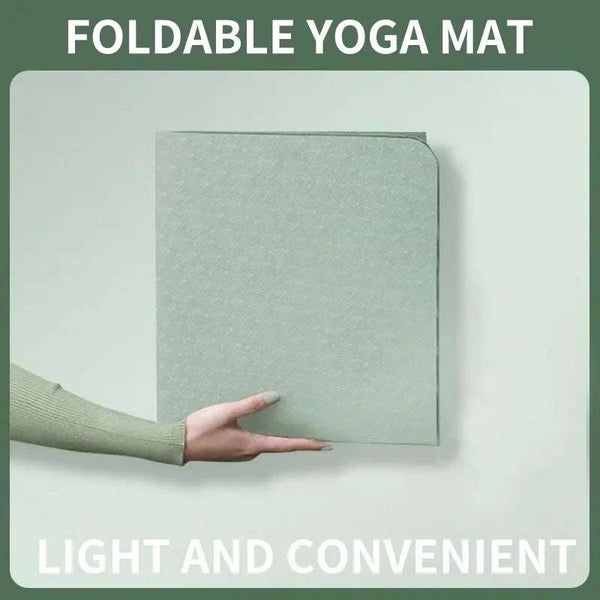 Foldable eco-friendly TPE yoga mat, light and convenient for travel fitness exercises.